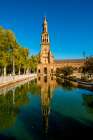 Large pond near the main building in Plaza de Espana, Seville, Andalusia, Spain. Art Print